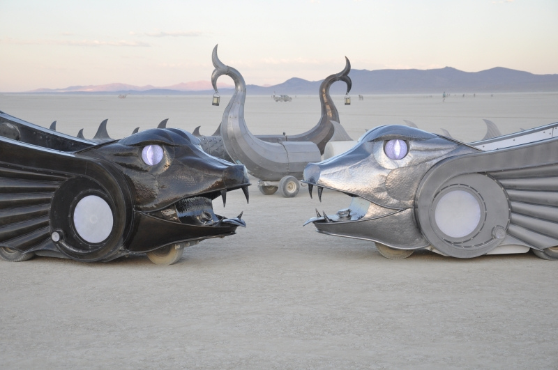 Illustration for article titled And now, two 50-foot-long cars shaped like mythological serpents